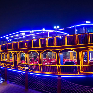 Вечерний круиз с ужином на арабской лодке в Абу-Даби Вечерний круиз с ужином на арабской лодке в Абу-Даби